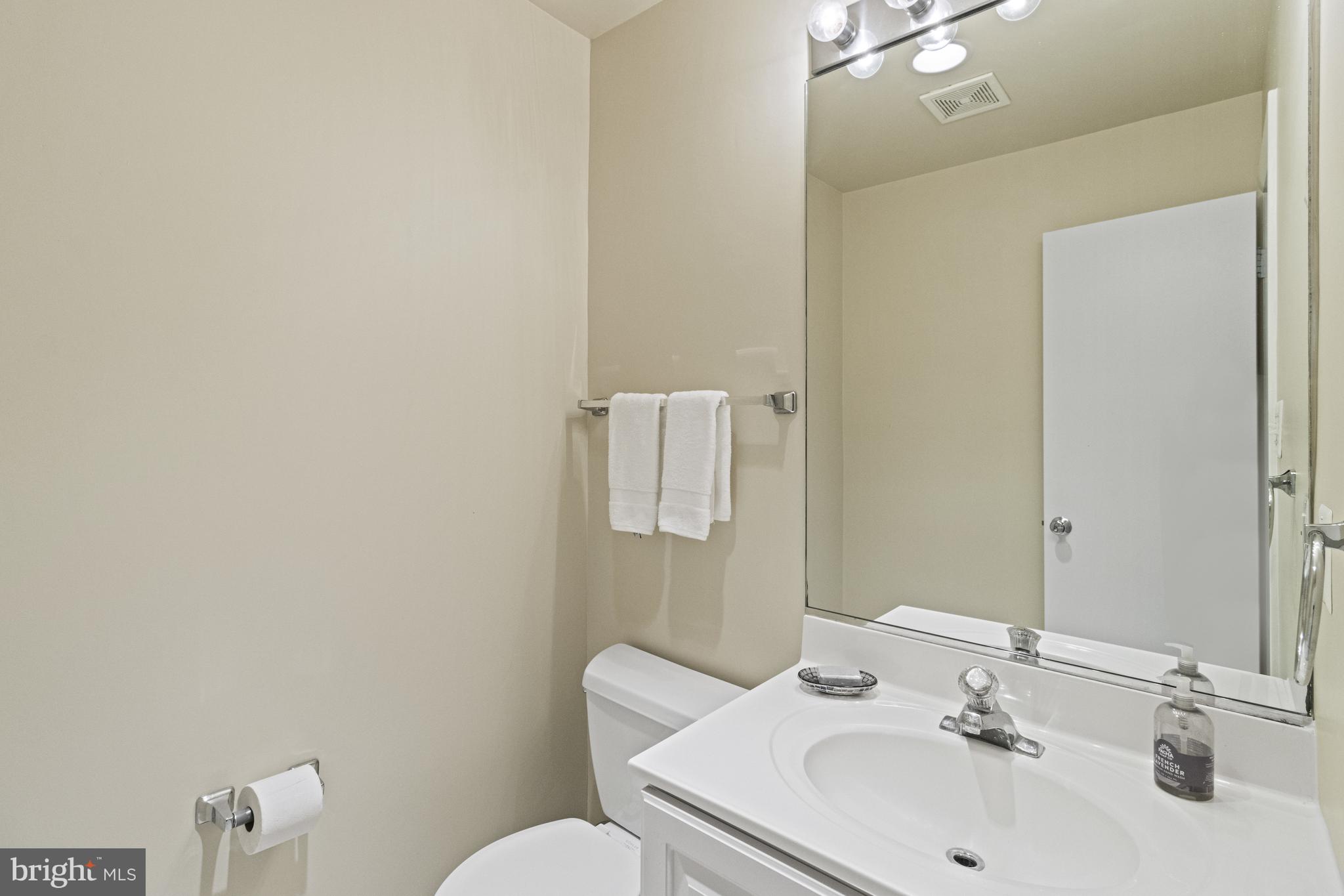 7107 Roxann Road Alexandria, VA 22315 - Photo 43 of 62 a bathroom with a sink and a toilet