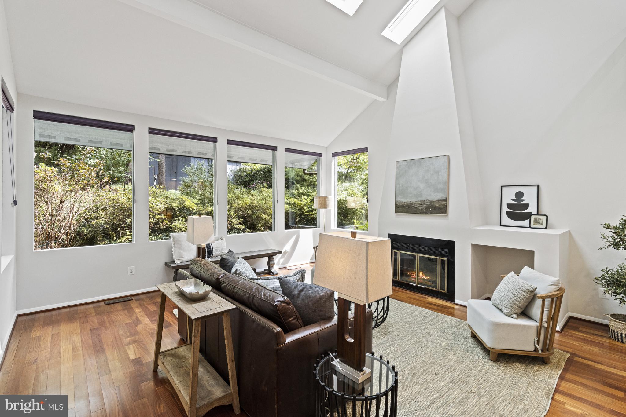 7107 Roxann Road Alexandria, VA 22315 - Photo 6 of 62 a living room with furniture and a fireplace