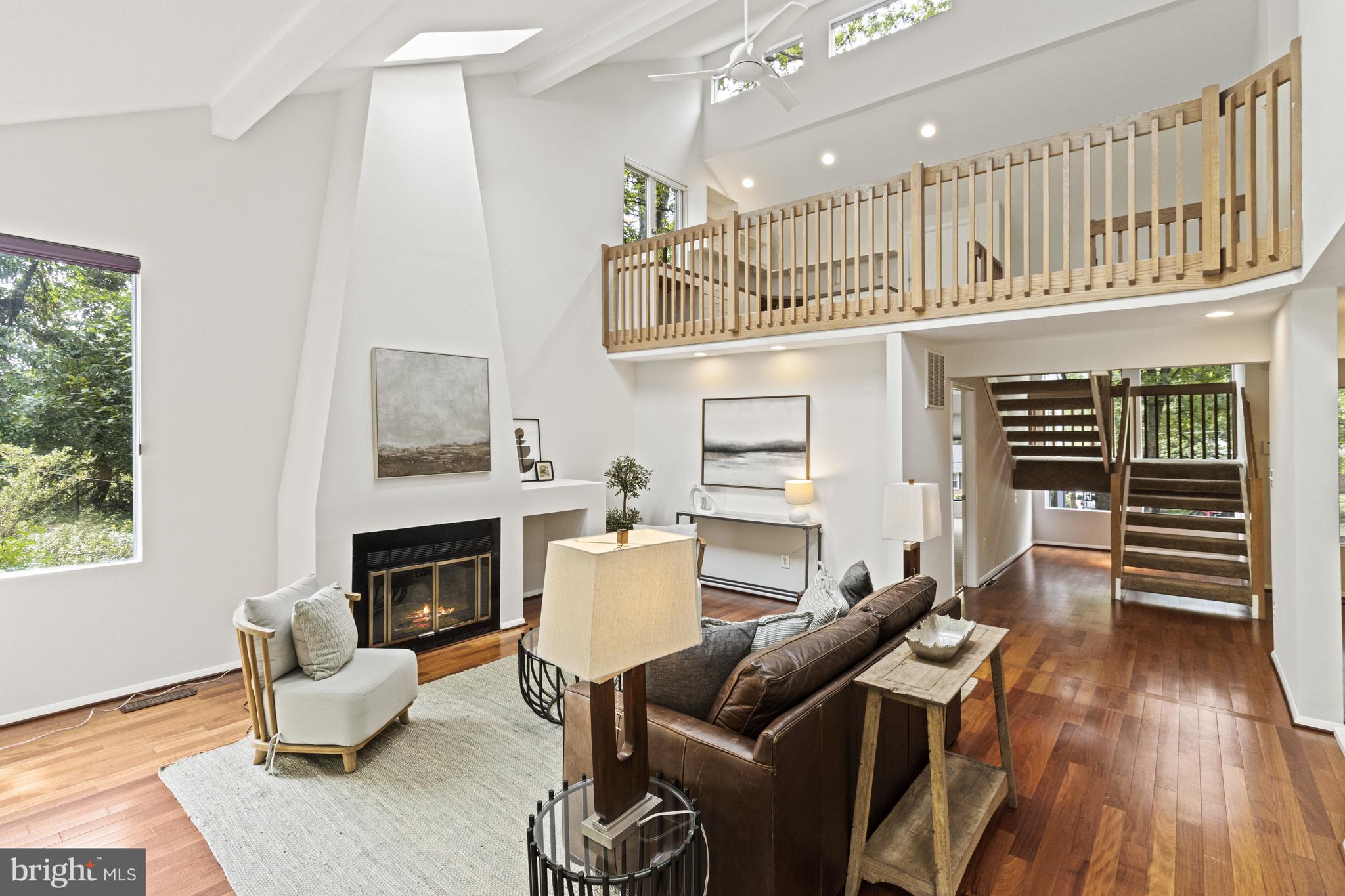 7107 Roxann Road Alexandria, VA 22315 - Photo 7 of 62 a living room with furniture or fireplace and a wooden floor