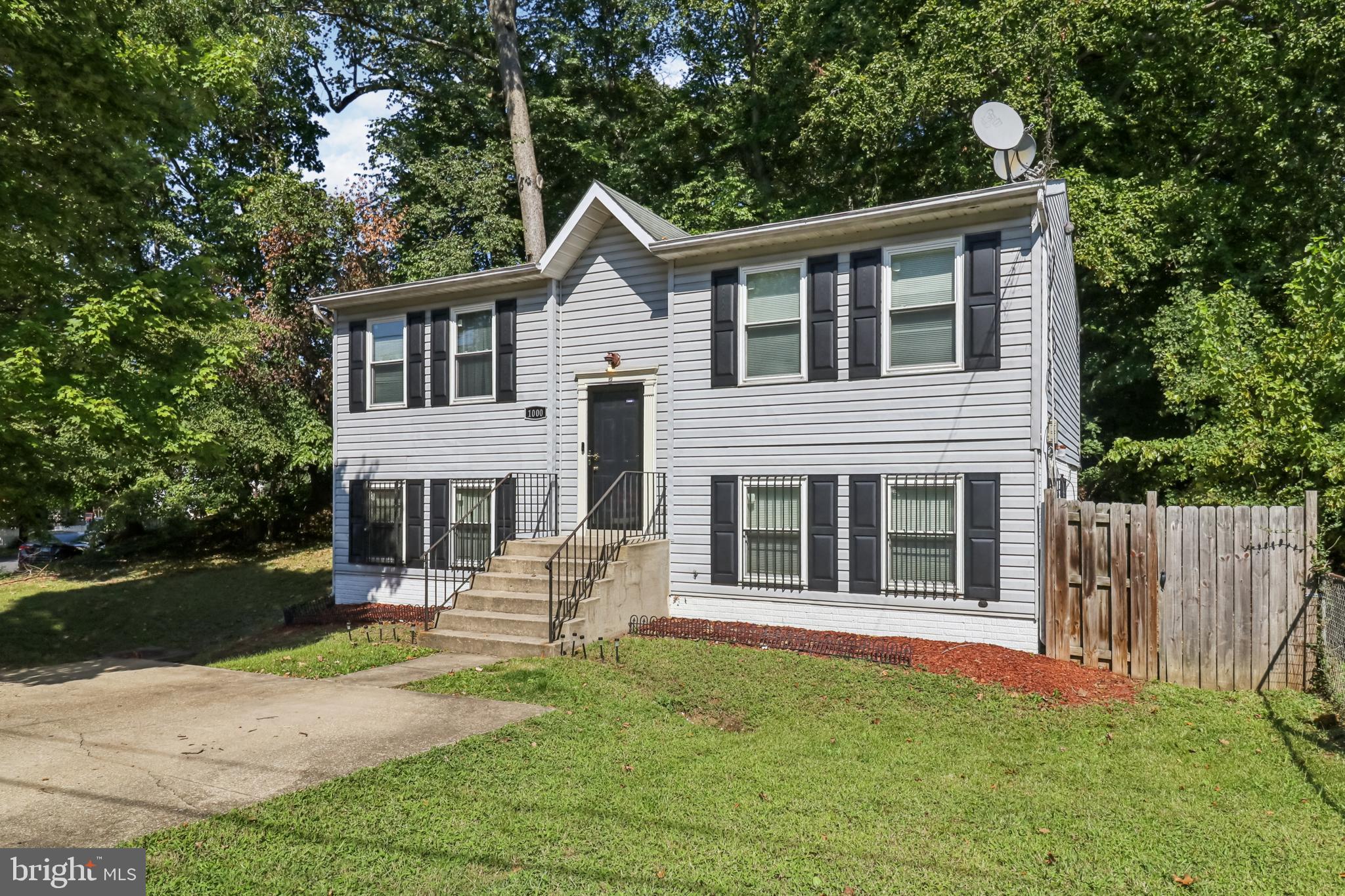 1000 Ute Way Capitol Heights, MD 20743 - Photo 2 of 51 a front view of a house with a yard