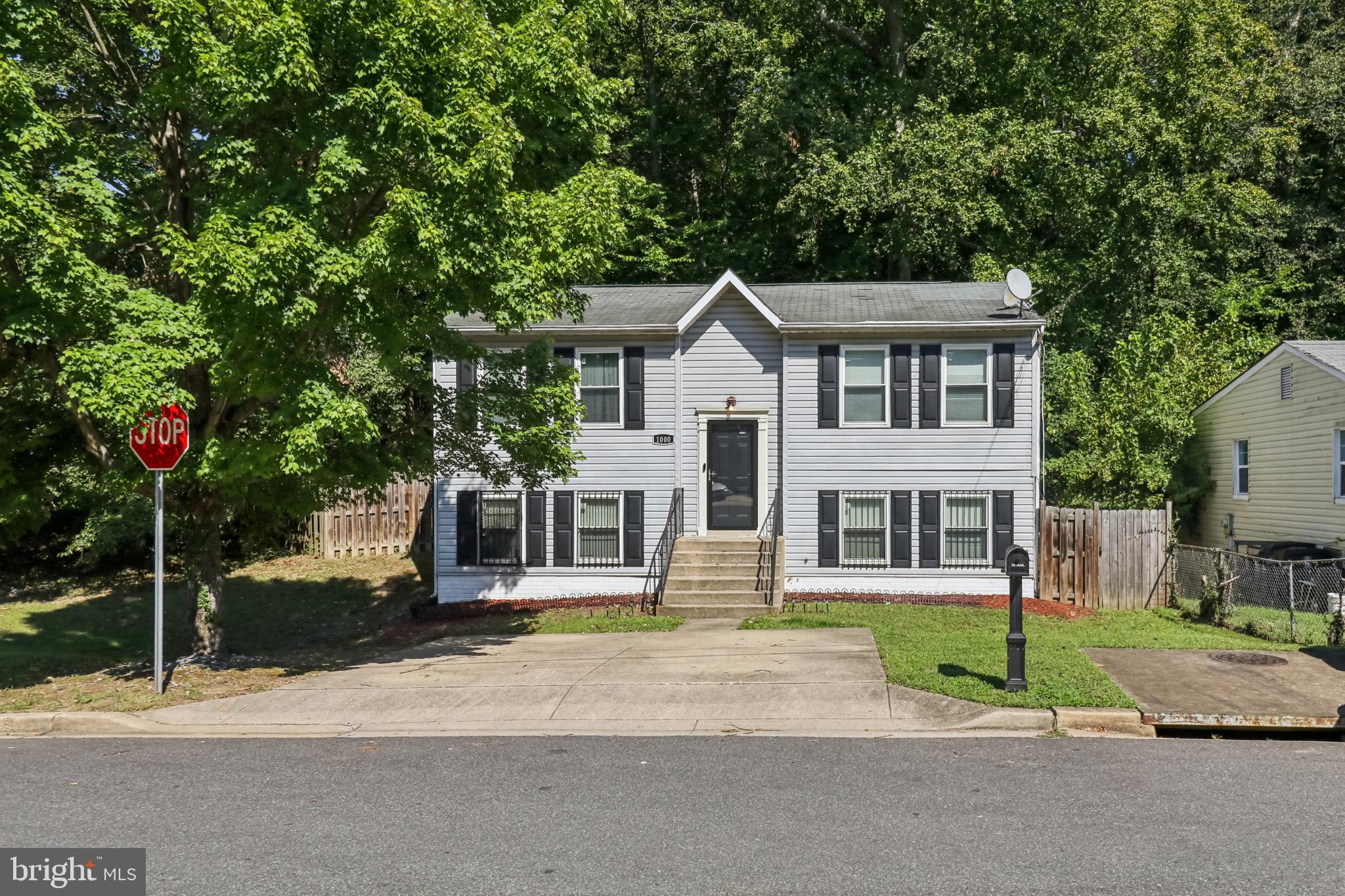 1000 Ute Way Capitol Heights, MD 20743 - Photo 3 of 51 a front view of a house with garden