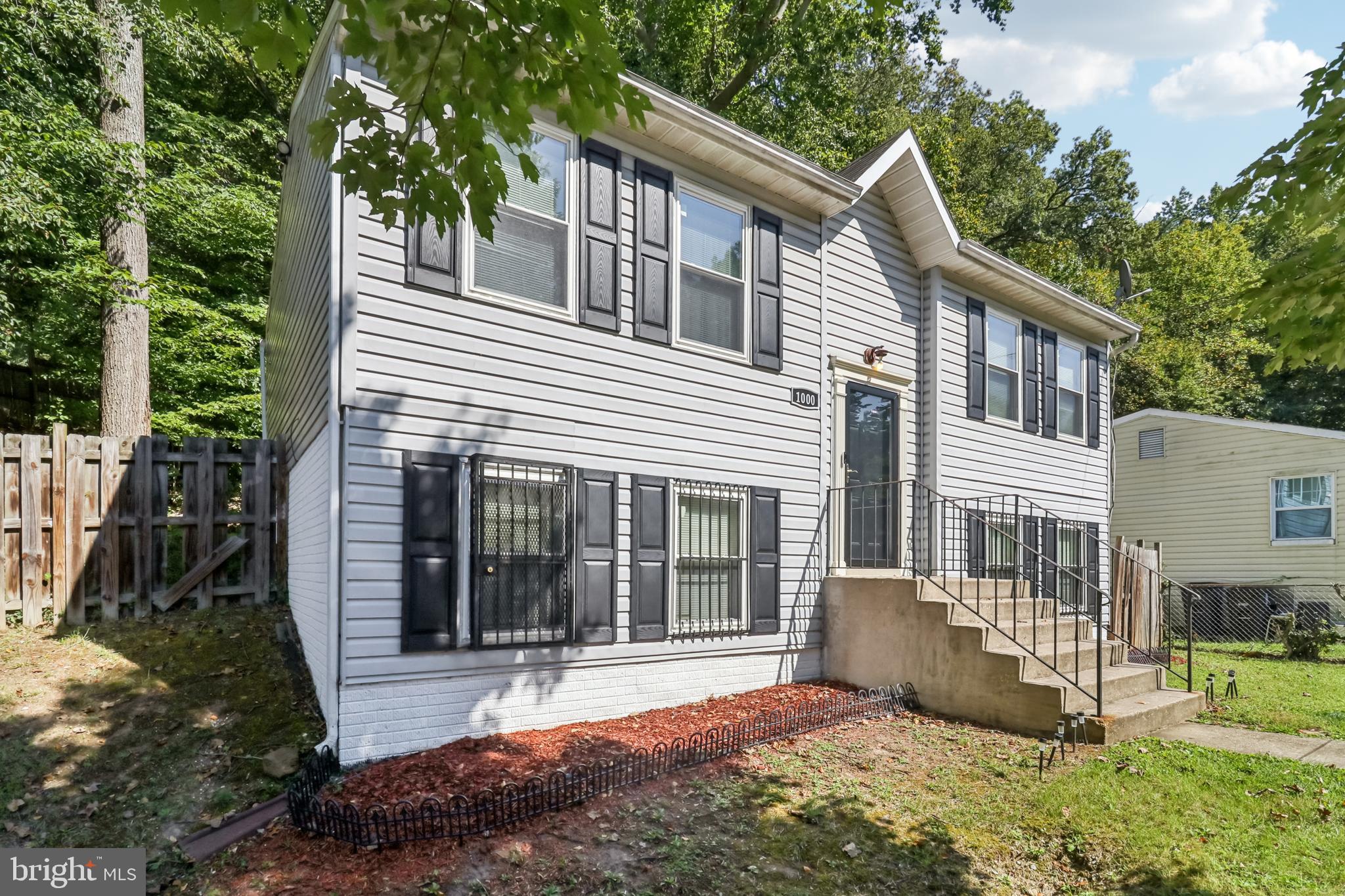 1000 Ute Way Capitol Heights, MD 20743 - Photo 6 of 51 a view of a house with a yard and sitting area