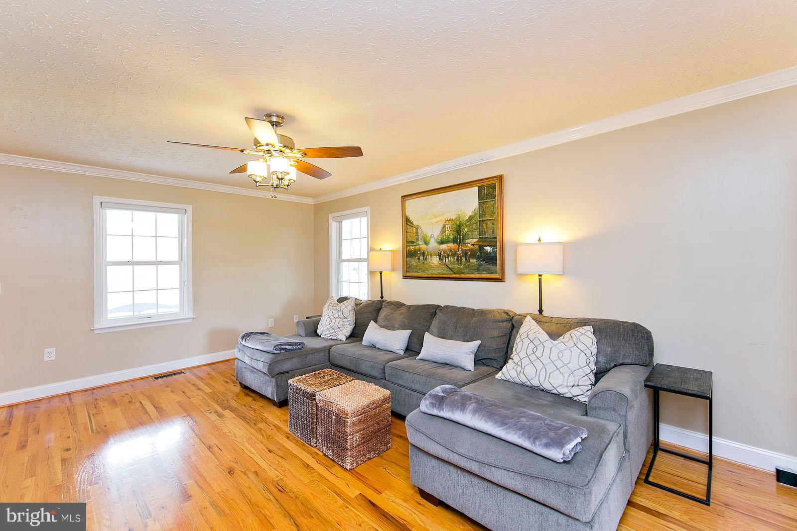 6363 Middle Road Stephens City, VA 22655 - Photo 10 of 81 Living room with crown molding