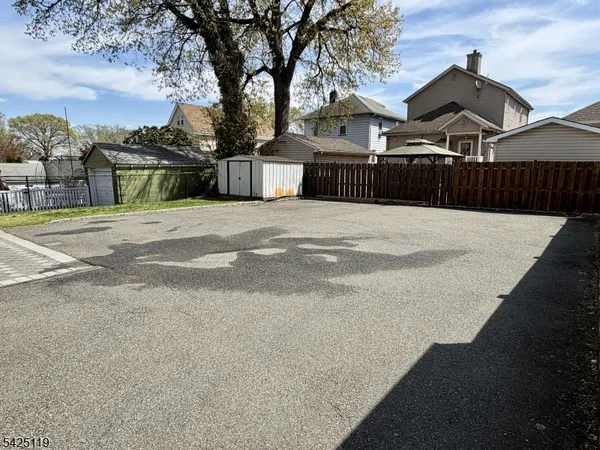 a street view with wooden fence
