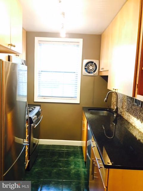 4319 2nd Road North, Unit 3 Arlington, VA 22203 - Photo 3 of 8 a room with window and air hockey table