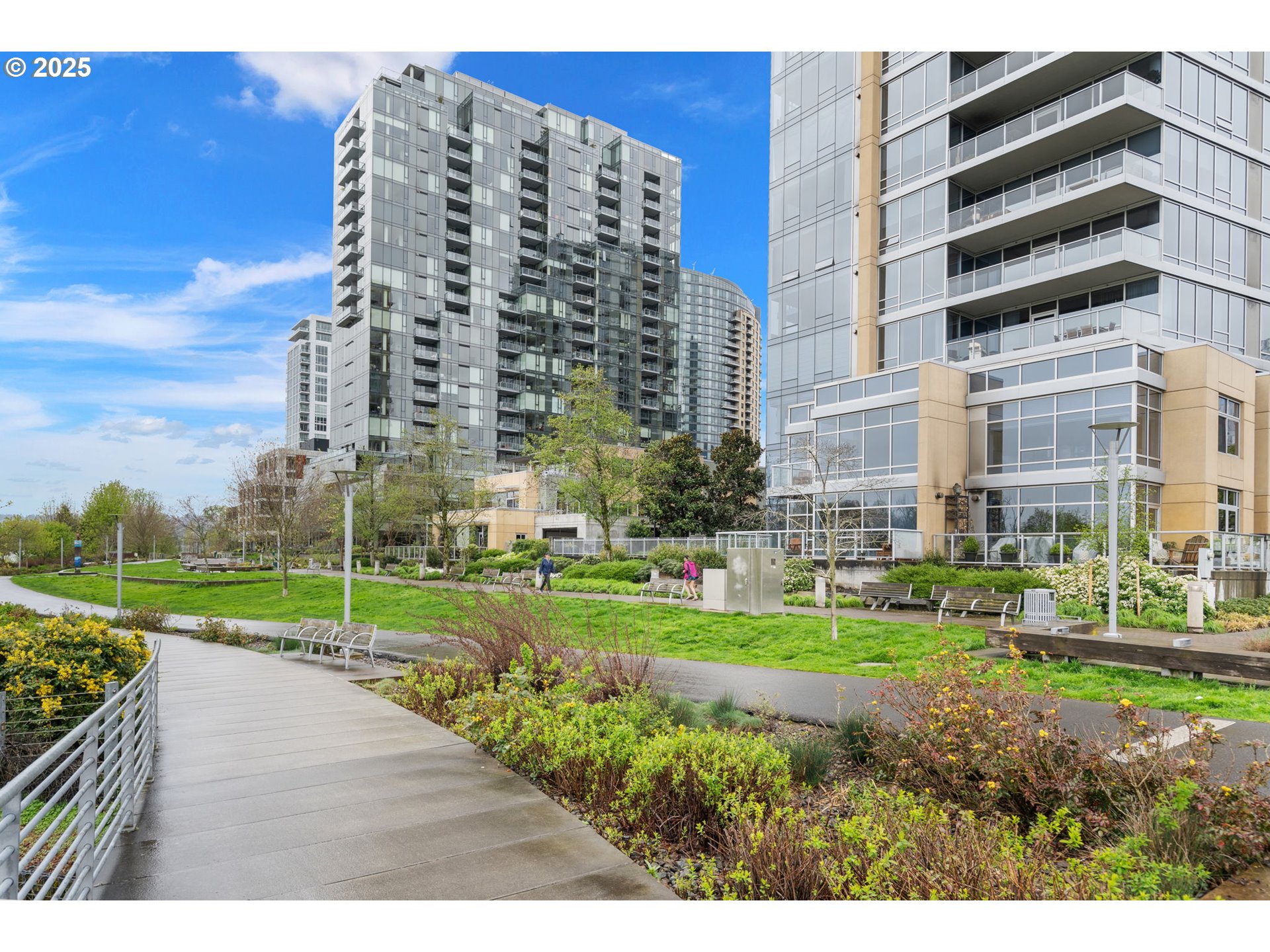 3570 South River Parkway, Unit 1005 Portland, OR 97239 - Photo 1 of 44 a view of a big building next to a big yard