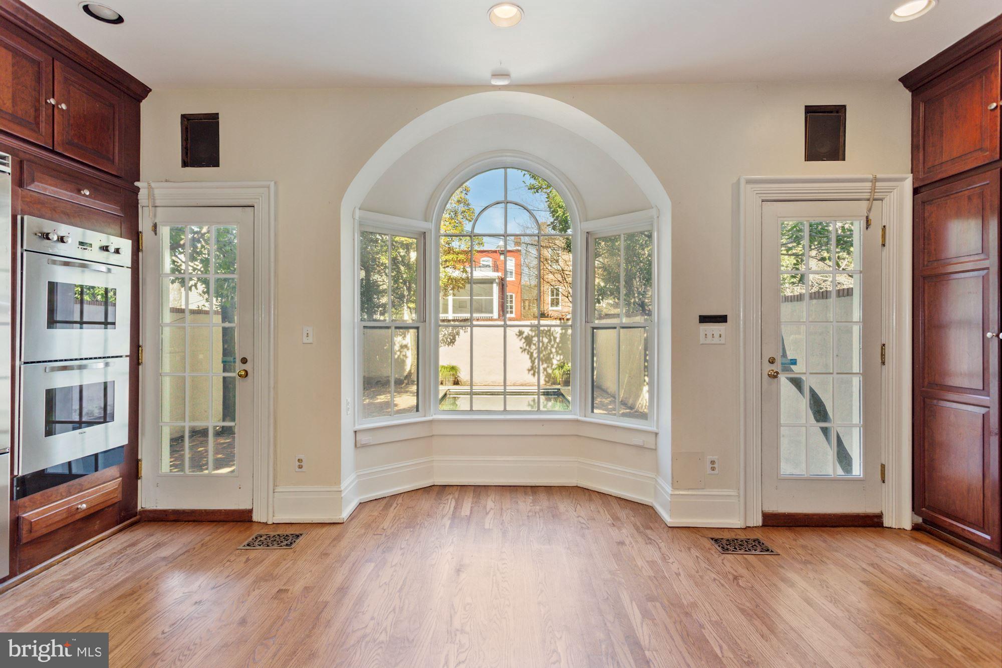 3129 N Street Northwest Washington, DC 20007 - Photo 10 of 28 KITCHEN OVERLOOKING POOL