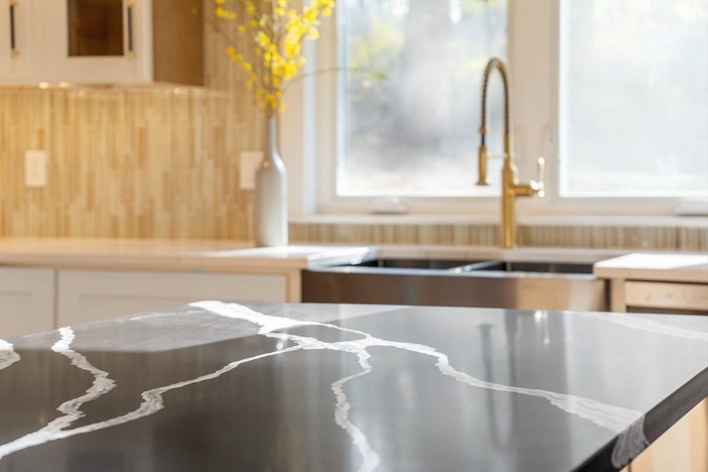 896 Main Street Reading, MA 01867 - Photo 23 of 41 a view of a bathroom with bathtub and window