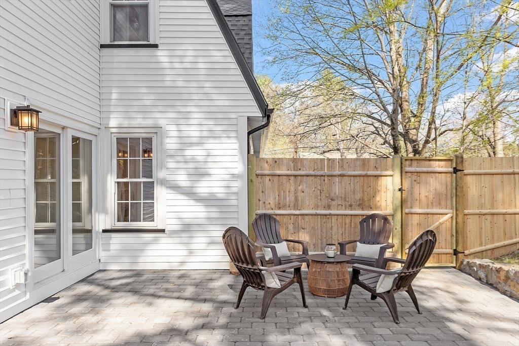896 Main Street Reading, MA 01867 - Photo 37 of 41 a couple of chairs sitting in front of a house