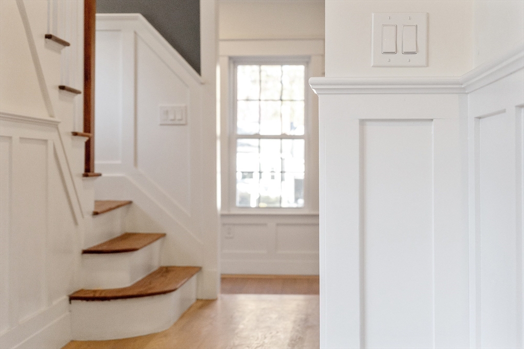 896 Main Street Reading, MA 01867 - Photo 6 of 41 a bathroom with a toilet and a window