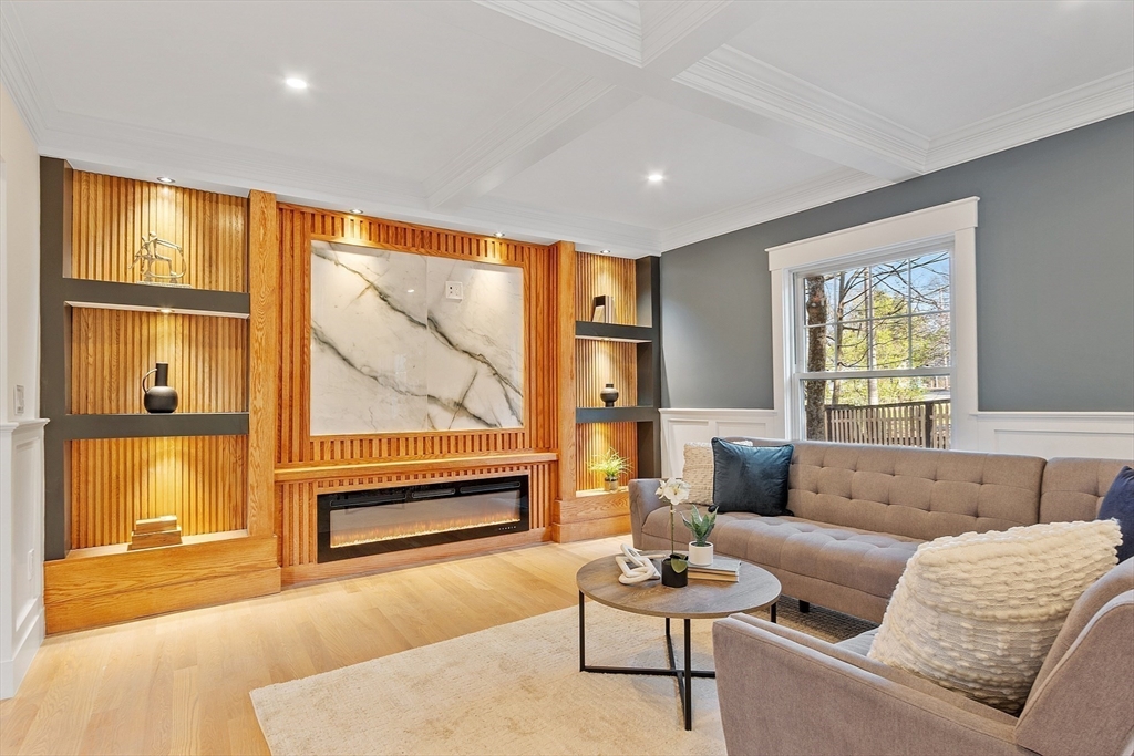 896 Main Street Reading, MA 01867 - Photo 9 of 41 a living room with furniture and a large window
