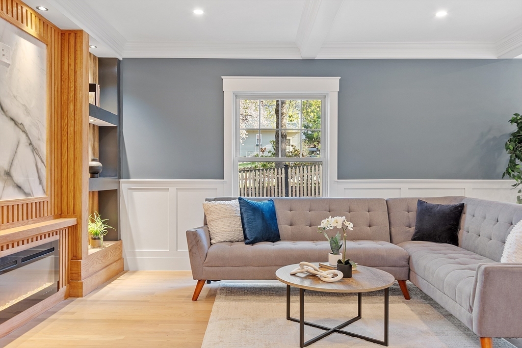 896 Main Street Reading, MA 01867 - Photo 10 of 41 a living room with furniture and a large window