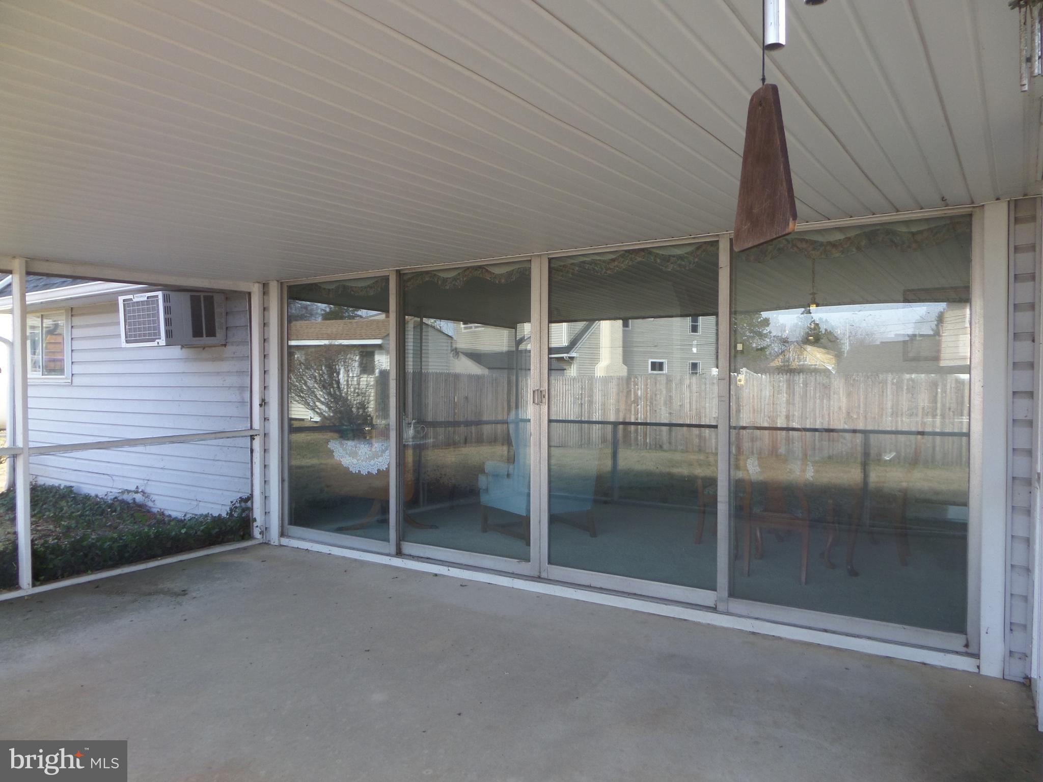 21 Hawk Road Levittown, PA 19056 - Photo 20 of 35 Ahh, the "GREAT WALL of WINDOWS" to the PORCH