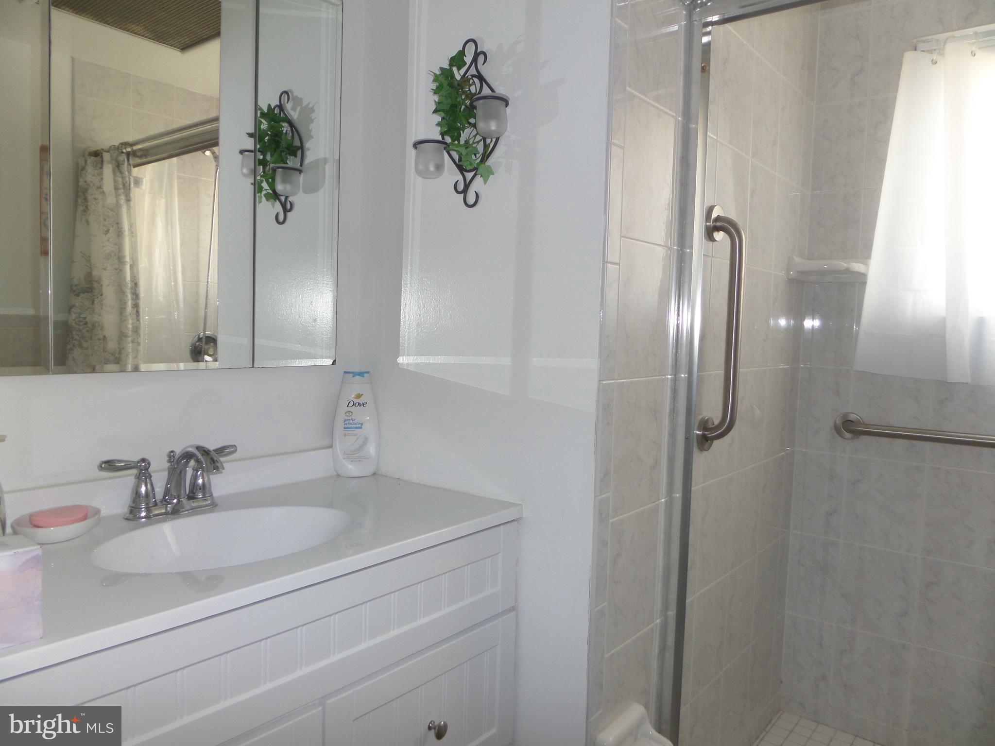 21 Hawk Road Levittown, PA 19056 - Photo 24 of 35 Downstairs Bathroom: upgraded with Walk-In shower!