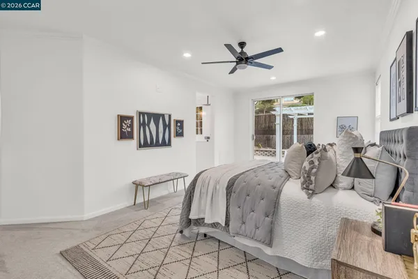 a bathroom with a double vanity sink and mirror