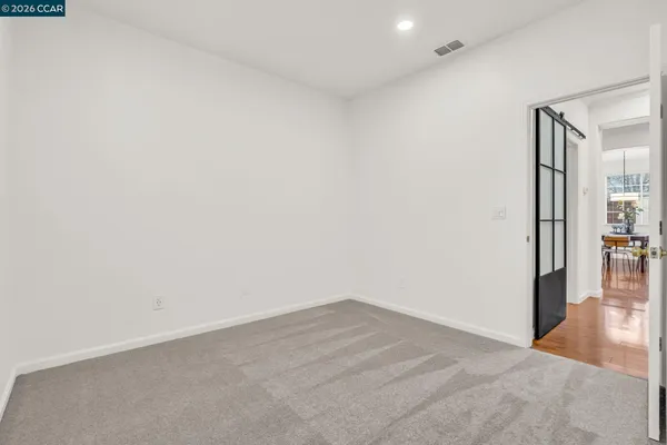 a bathroom with a window and a shower