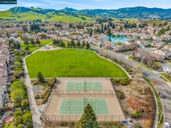 front view of a house with a small yard