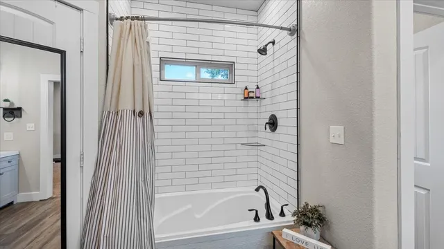 a bathroom with a bathtub