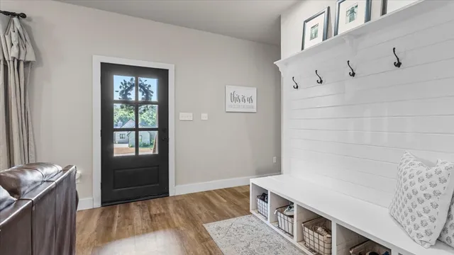 a room with a couch and a window