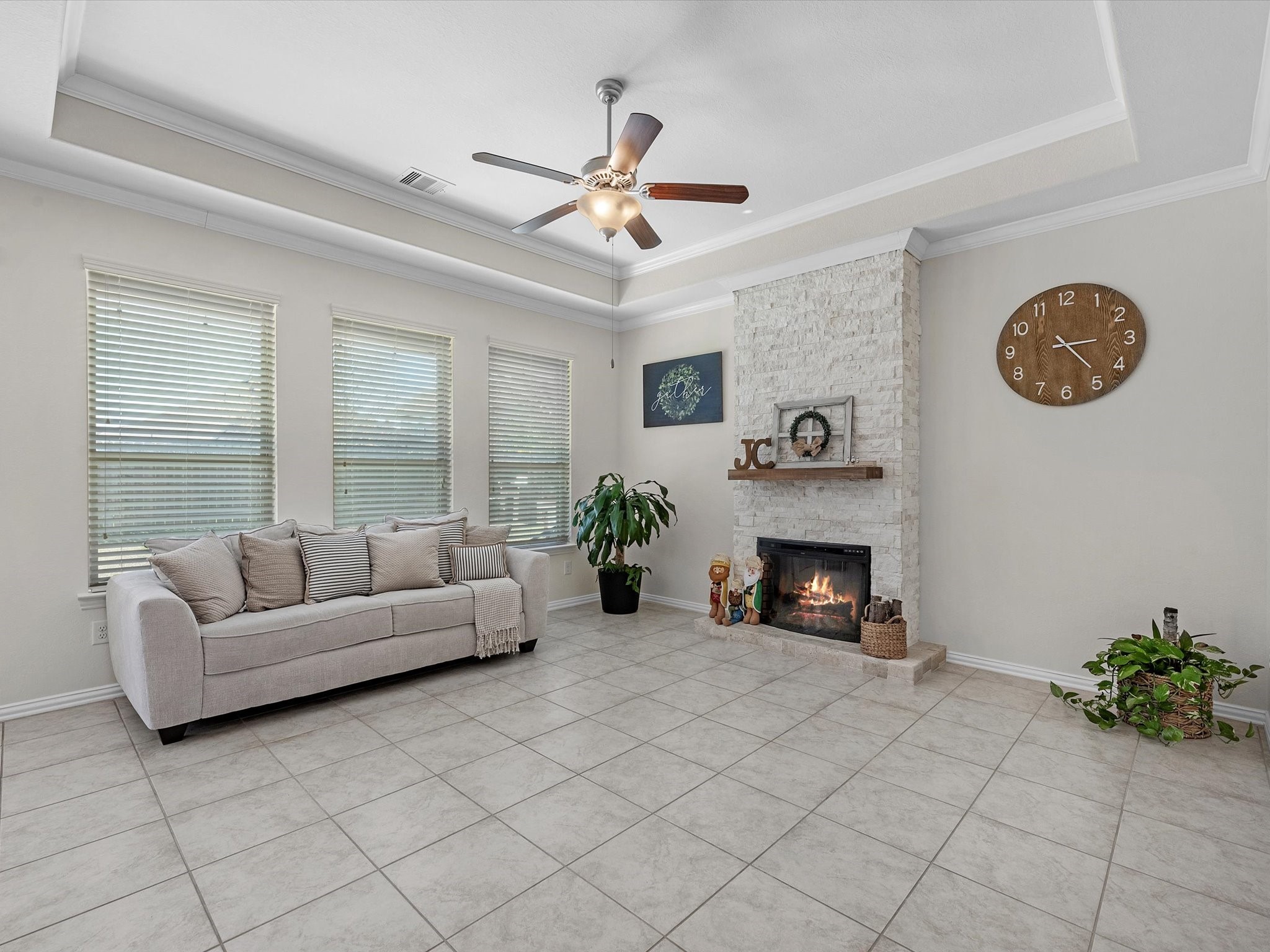 13838 Madera Bend Lane Rosharon, TX 77583 - Photo 12 of 32 Family room w/ a stone accented, gaslit fire place