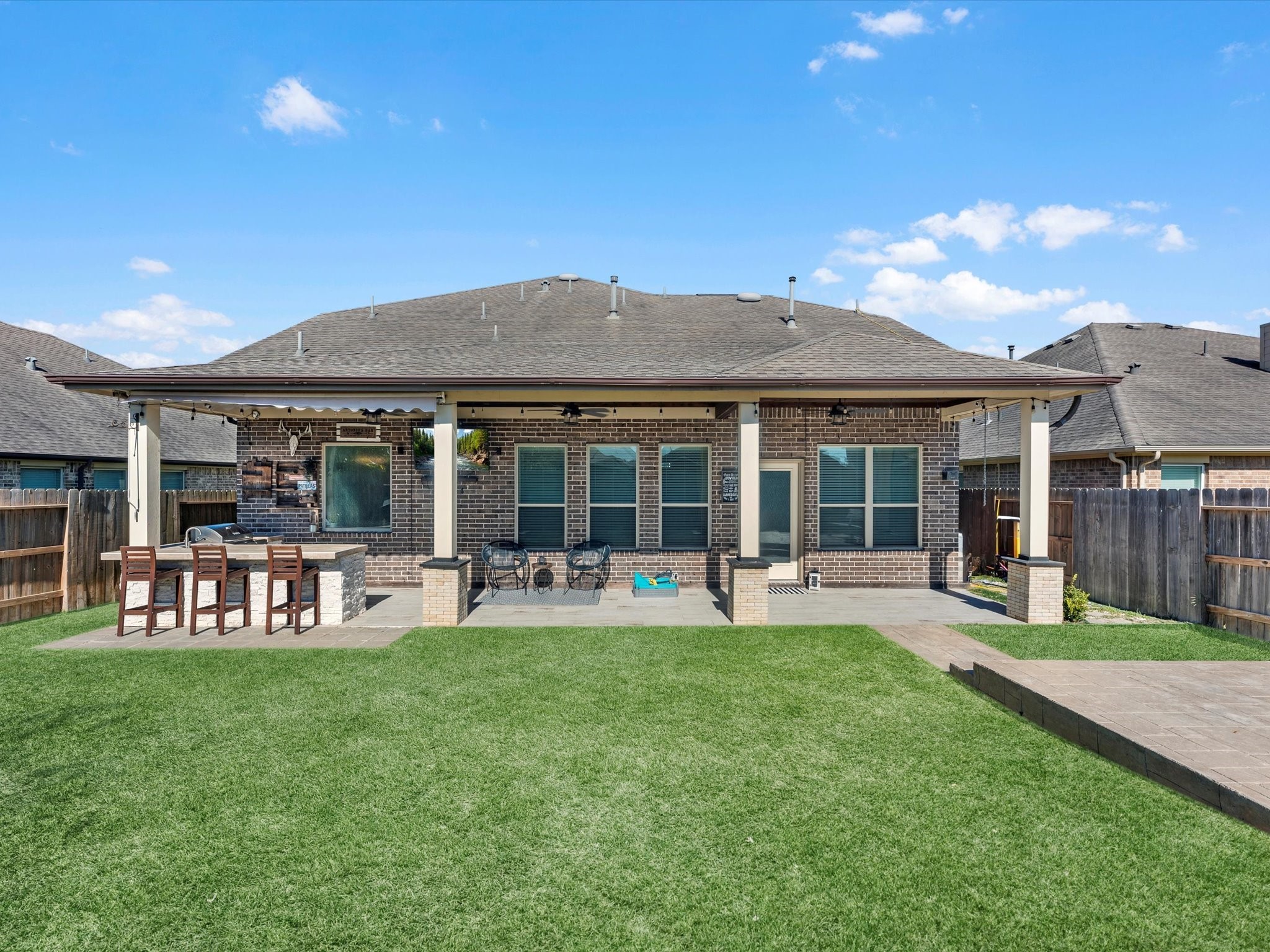 13838 Madera Bend Lane Rosharon, TX 77583 - Photo 3 of 32 Private backyard w/ ample green space and a full length, covered patio!