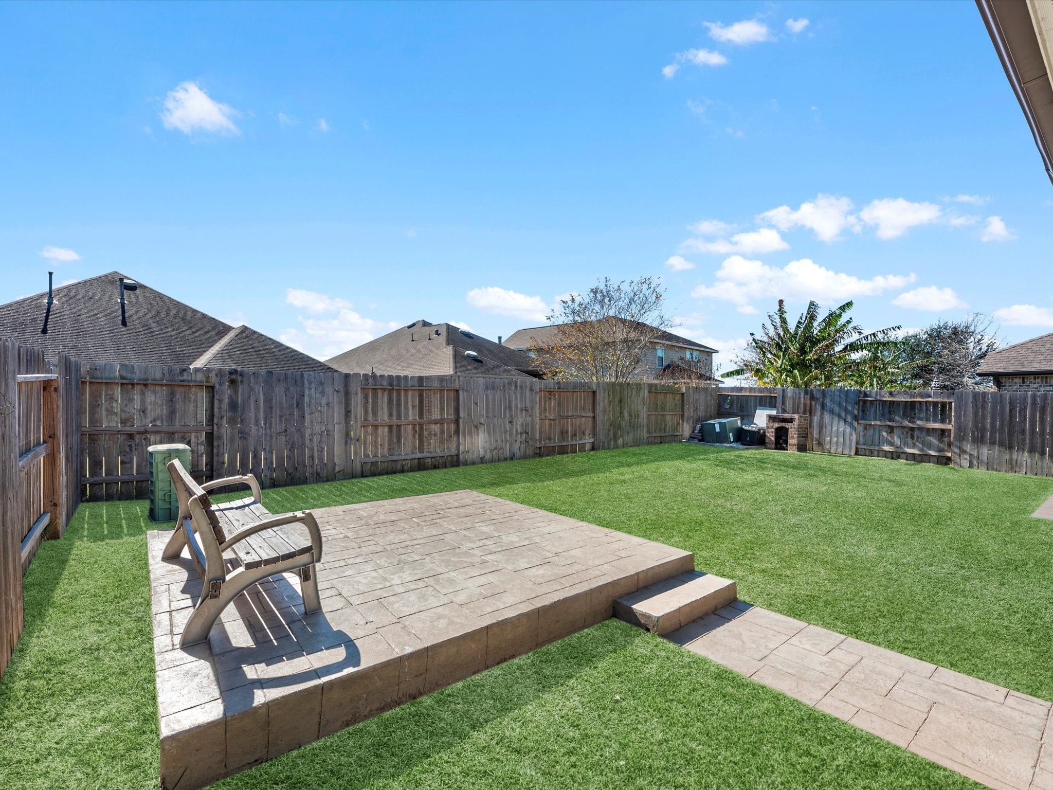 13838 Madera Bend Lane Rosharon, TX 77583 - Photo 7 of 32 A raised, concrete sitting deck, as well!