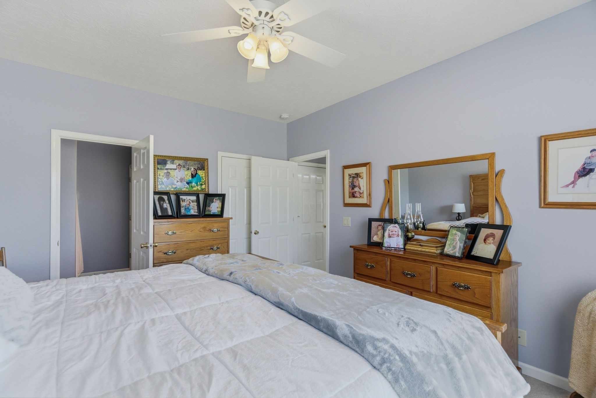 4357 Airport Road Springfield, TN 37172 - Photo 12 of 49 a bedroom with a bed and a chandelier