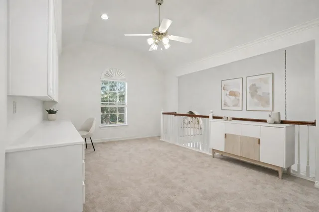 a view of a house with pool fire pit and sitting area