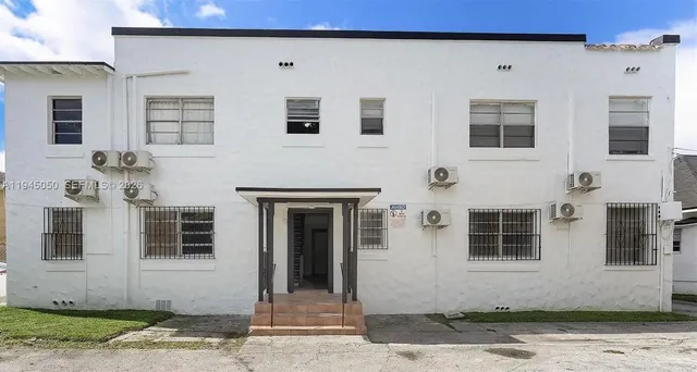 a car parked in front of a house