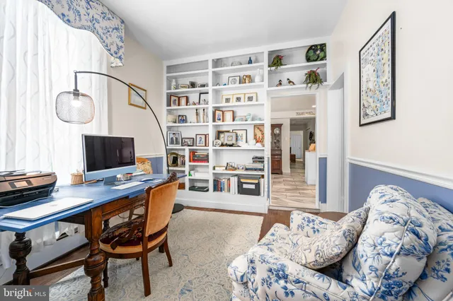 a kitchen with stainless steel appliances kitchen island granite countertop a refrigerator and a stove