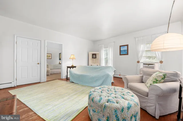 a room with furniture and a window