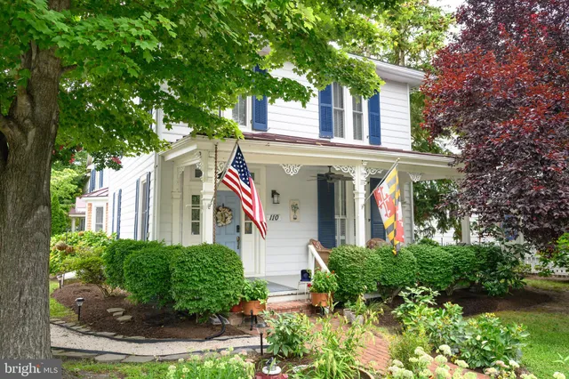 front view of a house with a small yard