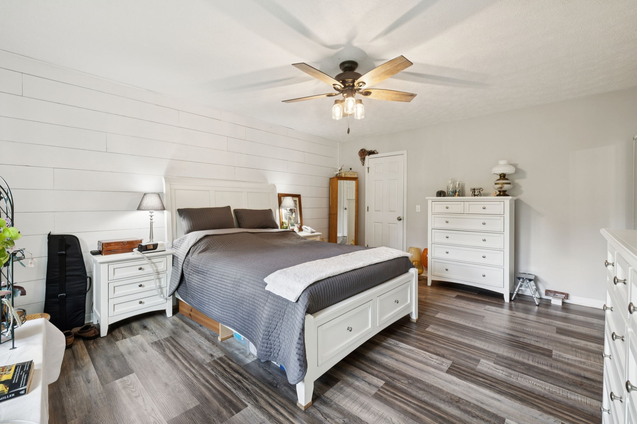 255 St Mary's Road Buffalo Valley, TN 38548 - Photo 42 of 61 a bedroom with a bed and a chandelier