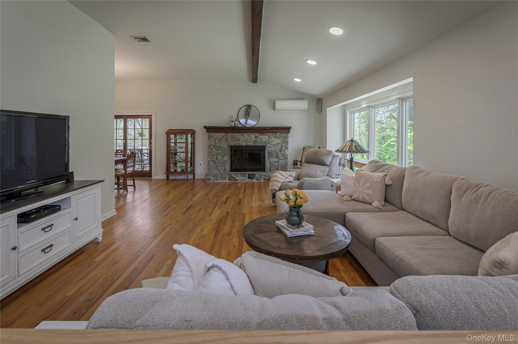 41 Cross Pond Road Pound Ridge, NY 10576 - Photo 4 of 41 a living room with furniture fireplace and window