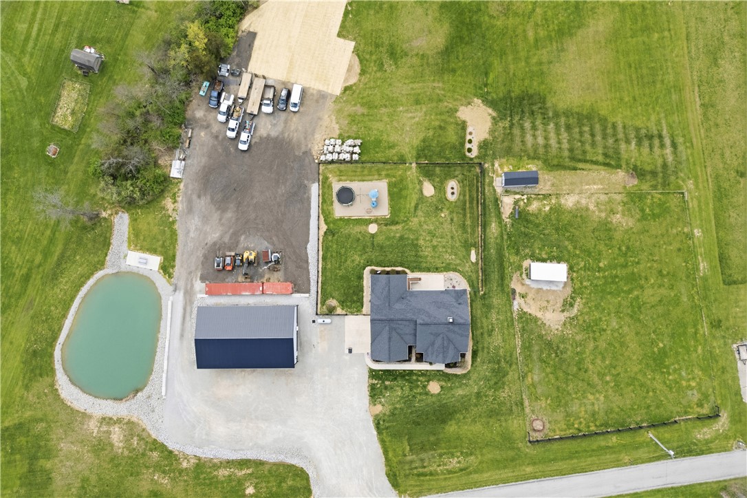1158 Pyle Road Clarksville, OH 45113 - Photo 69 of 76 This expansive estate offers a blend of serene nature and functional outdoor amenities, ideal for diverse lifestyles.