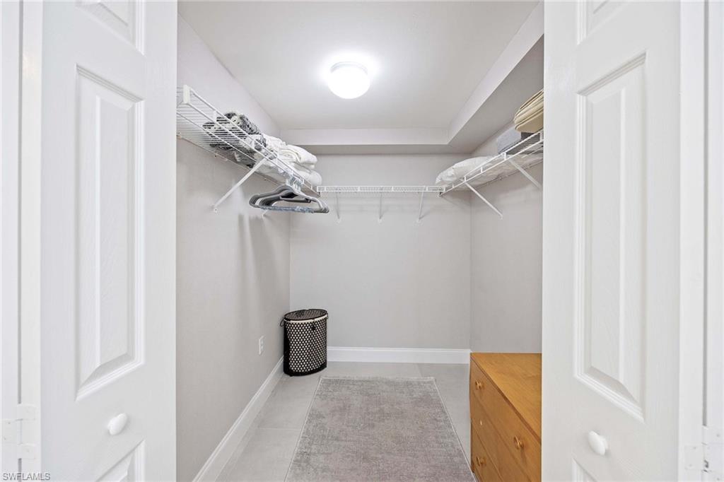 5455 Worthington Lane, Unit 103 Naples, FL 34110 - Photo 22 of 38 a view of a closet area