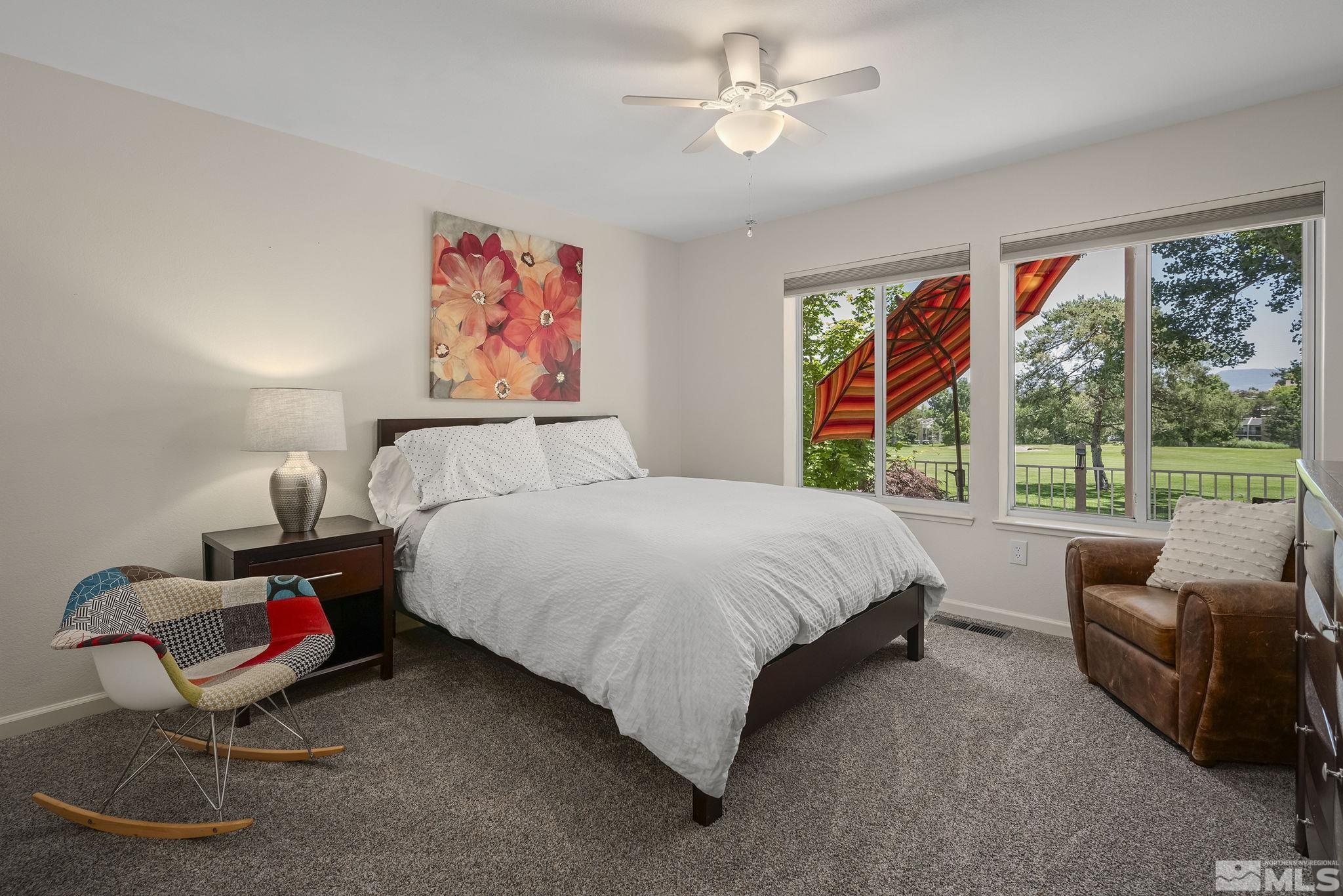 6156 Wycliffe Circle Reno, NV 89519 - Photo 19 of 30 a bedroom with a bed furniture and a window