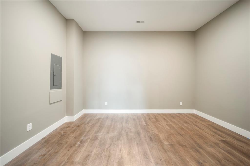 2956 Blalock Mountain Road Talking Rock, GA 30175 - Photo 36 of 65 a view of an empty room with wooden floor