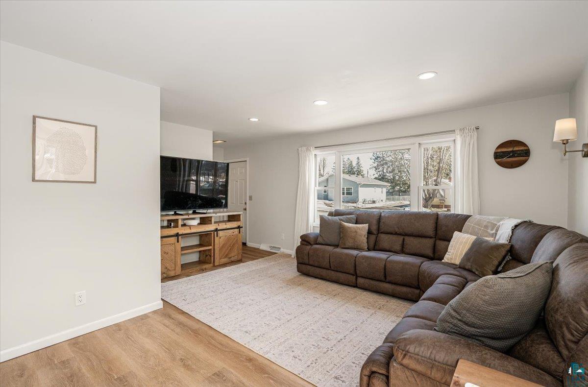 415 14th Street Cloquet, MN 55720 - Photo 5 of 20 Living room featuring light wood-style flooring and recessed lighting