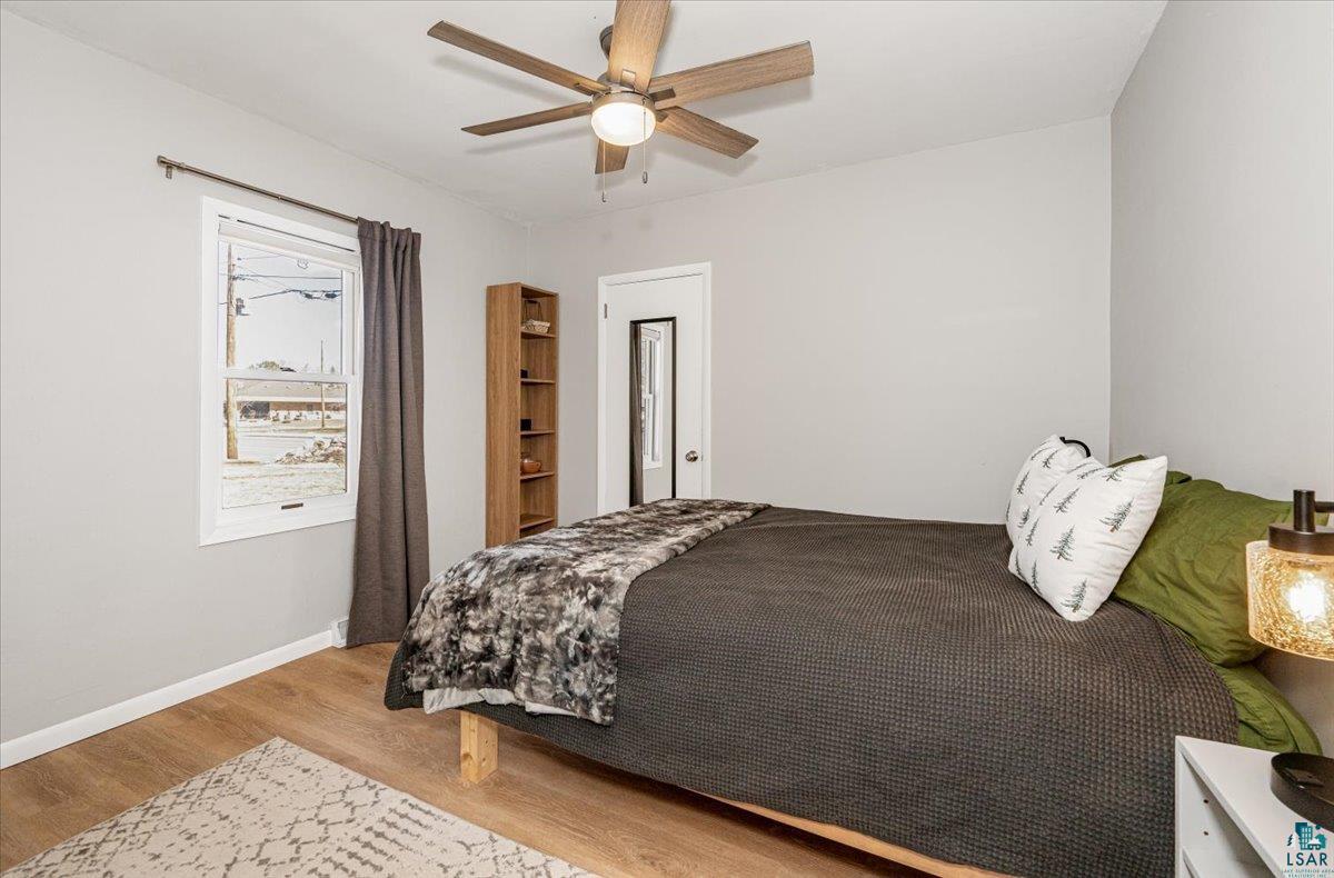 415 14th Street Cloquet, MN 55720 - Photo 8 of 20 Bedroom with light wood-type flooring and ceiling fan