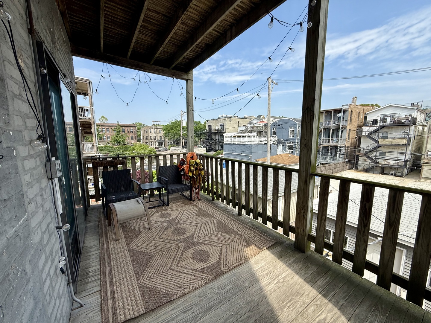 1132 West Addison Street, Unit 2 Chicago, IL 60613 - Photo 11 of 11 a view of a balcony with chairs