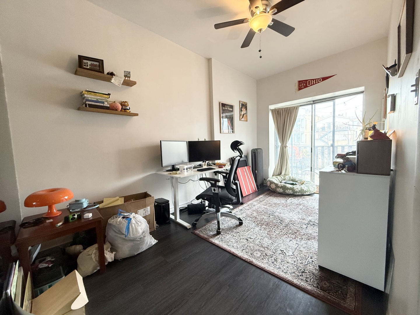 1132 West Addison Street, Unit 2 Chicago, IL 60613 - Photo 9 of 11 a living room with furniture and a window
