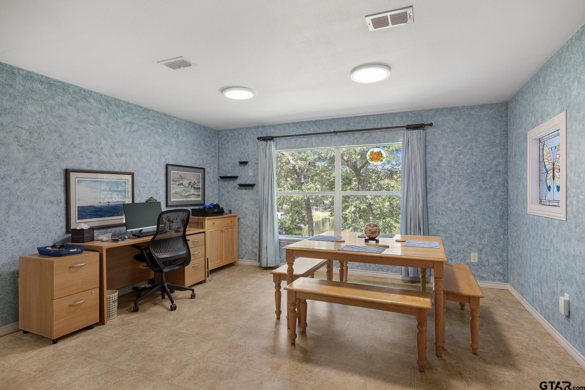 20650 West Grove Club Lake Road Whitehouse, TX 75791 - Photo 13 of 39 a view of a workspace with furniture and a window