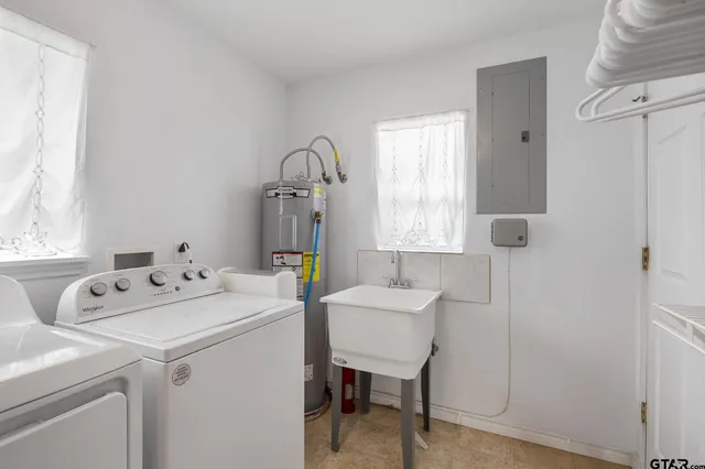 a utility room with dryer and washer