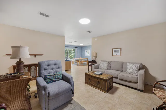 a living room with furniture and a couch