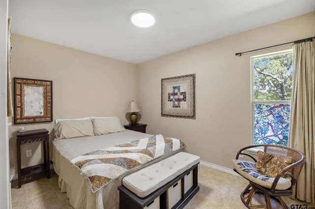 a bedroom with a bed and furniture