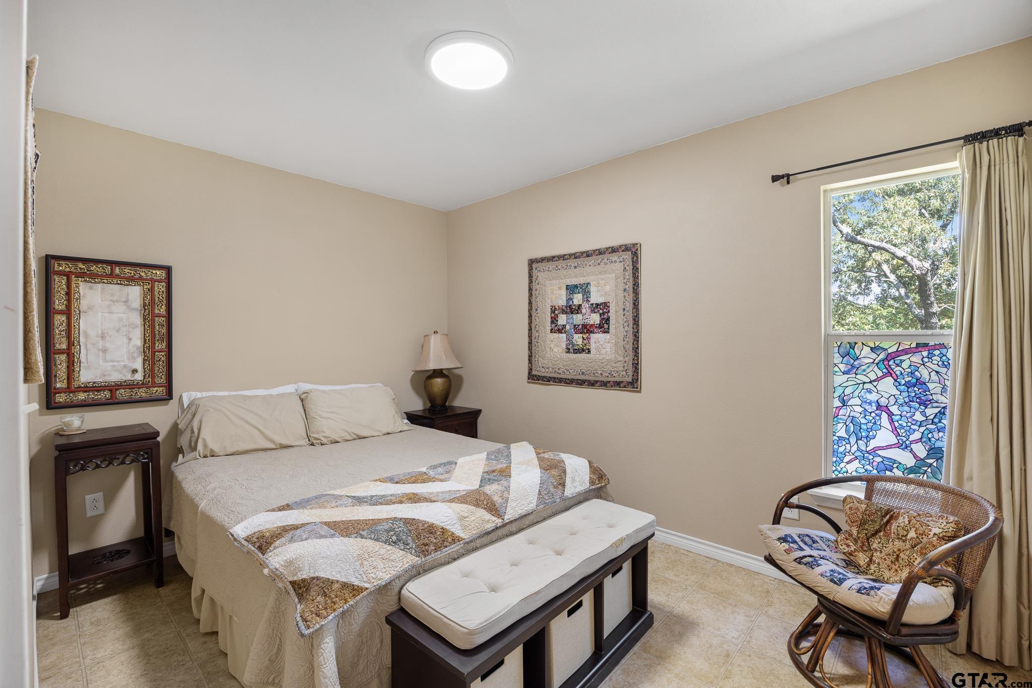 20650 West Grove Club Lake Road Whitehouse, TX 75791 - Photo 24 of 39 a bedroom with a bed and furniture