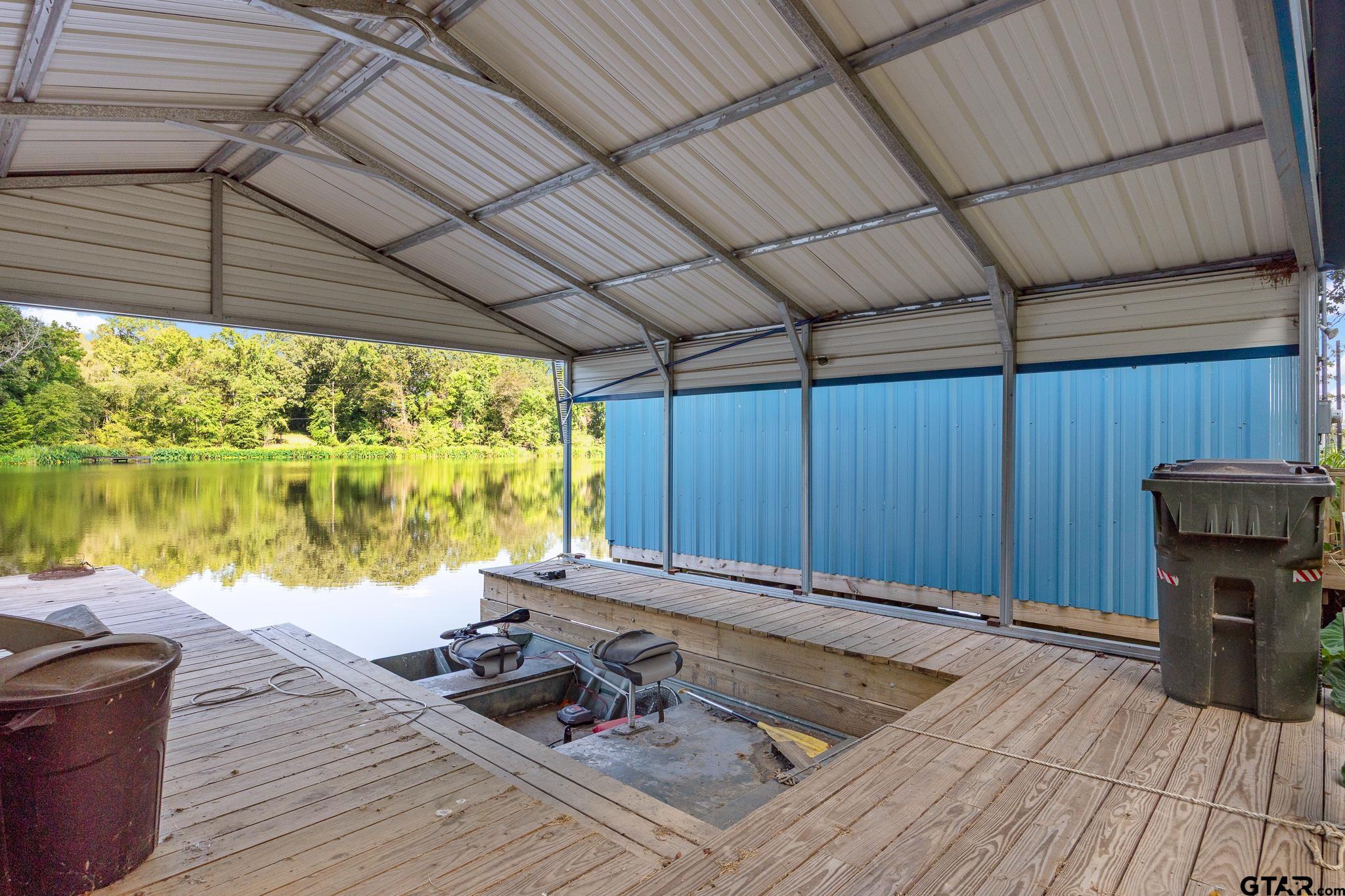 20650 West Grove Club Lake Road Whitehouse, TX 75791 - Photo 29 of 39 a view of a backyard of a house with a seating space