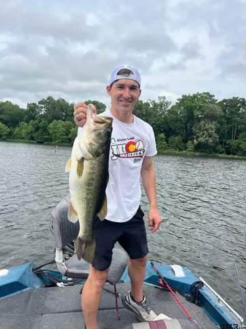 a view of swimming pool with sitting area