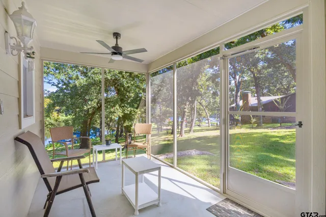 a living room with patio area and balcony